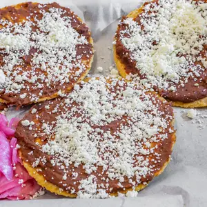 Catrachitas - Fried Corn Tortillas with Beans and Cheese