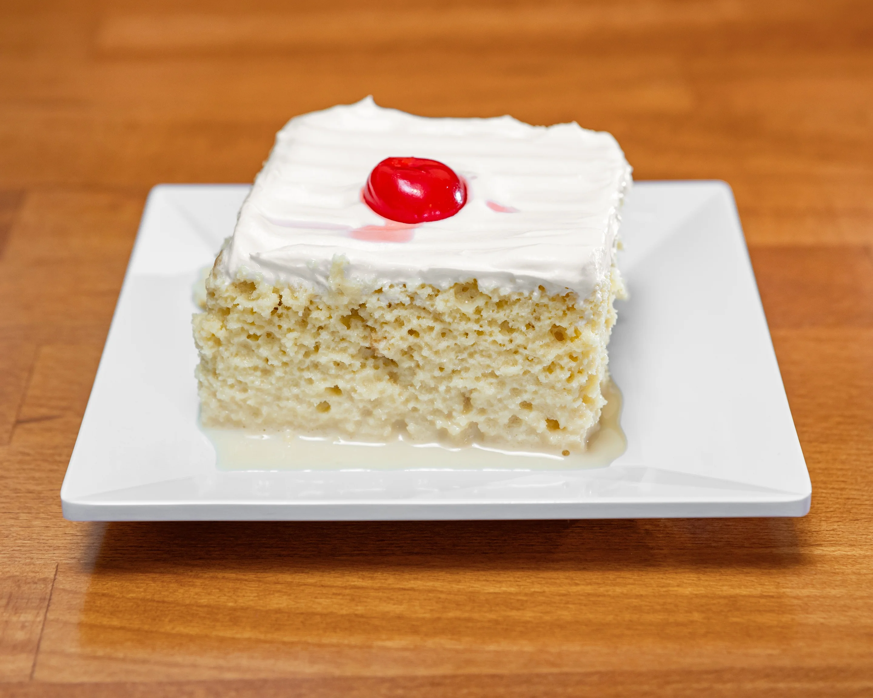 Tres Leches Cake - Moist sponge cake soaked in three kinds of milk